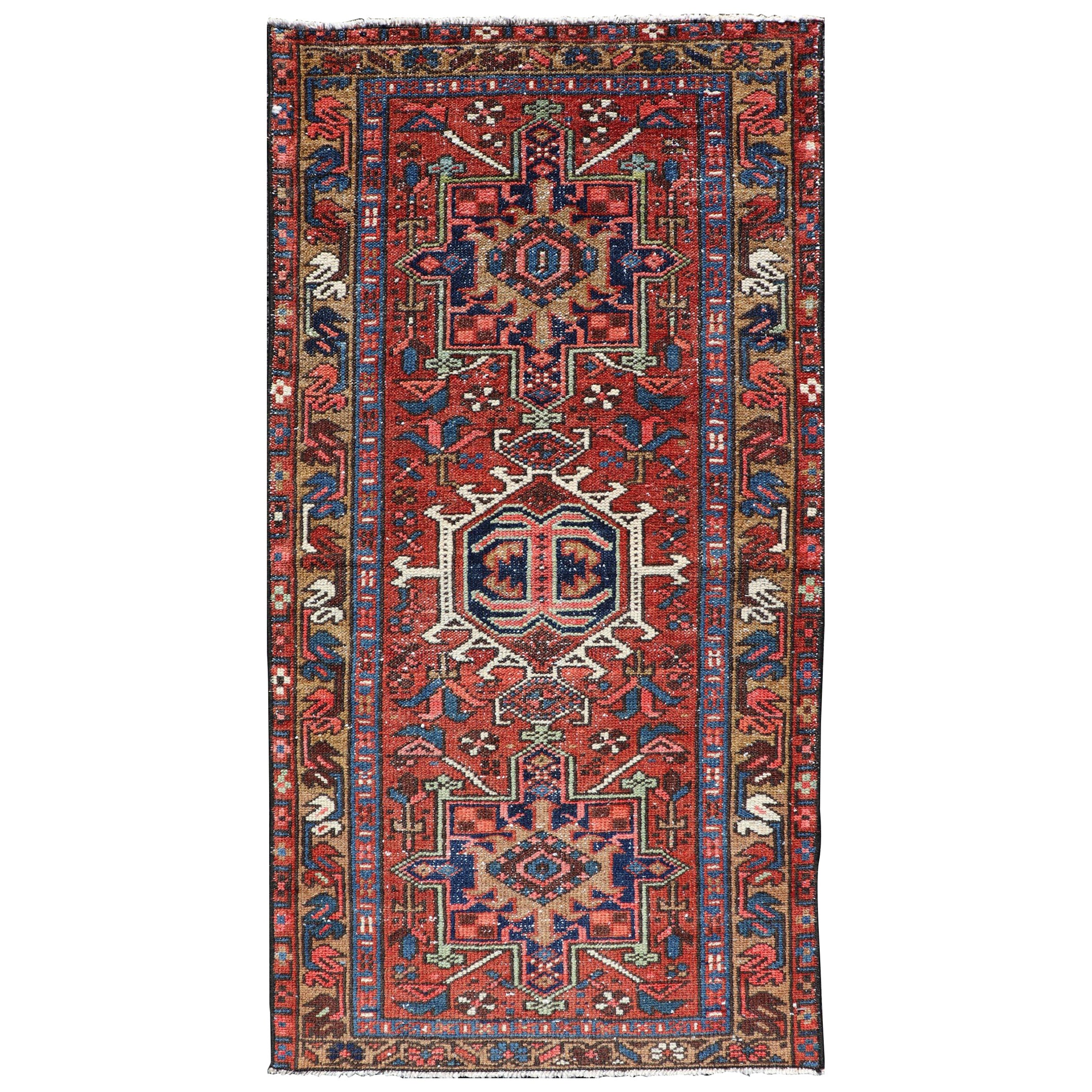 Antique Colorful Persian Heriz Rug with a Bold Geometric Design For Sale