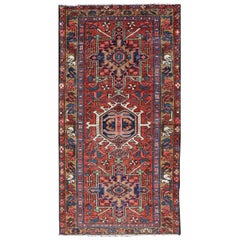 Vintage Colorful Persian Heriz Rug with a Bold Geometric Design