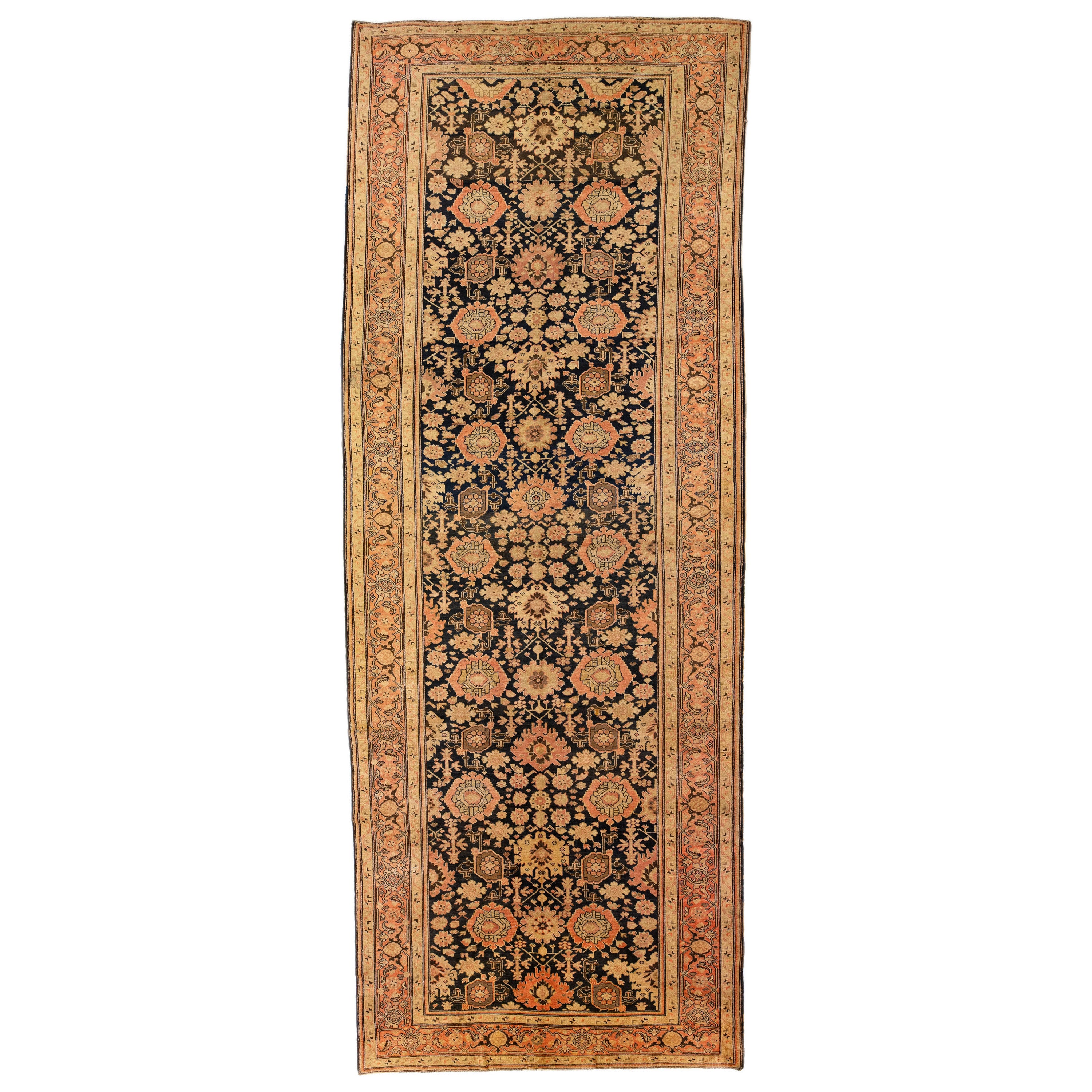 Antique Karabakh Handmade Floral Wool Runner with Dark Blue Field For Sale