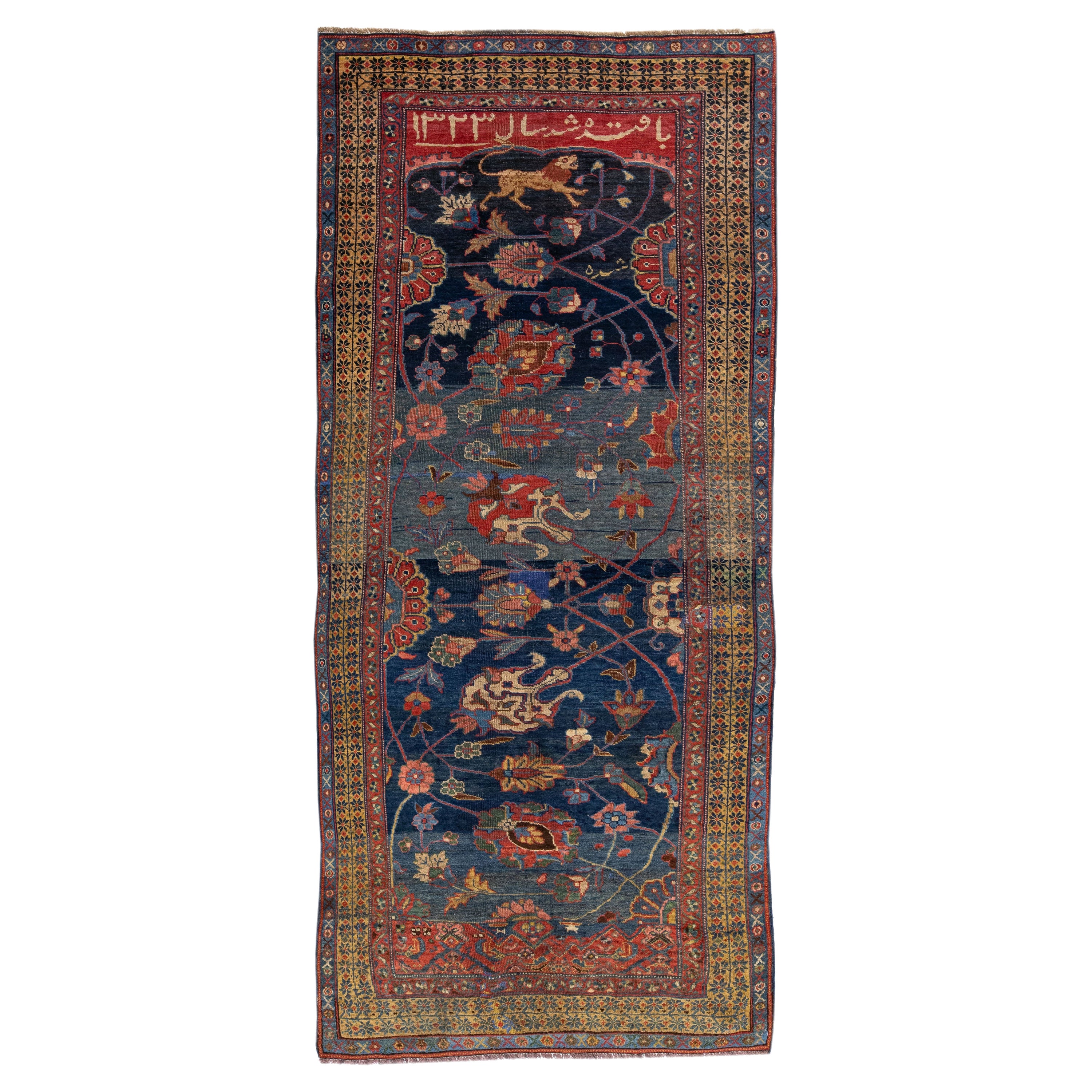 Tapis persan ancien Bidjar en laine bleue fait à la main avec motif floral