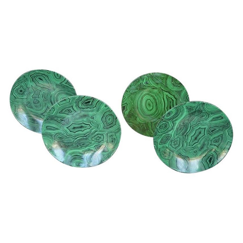 Ensemble de quatre assiettes Fornasetti en malachite