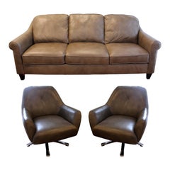 Contemporary Transitional Pair of Naugahyde Swivel Chairs and Sofa