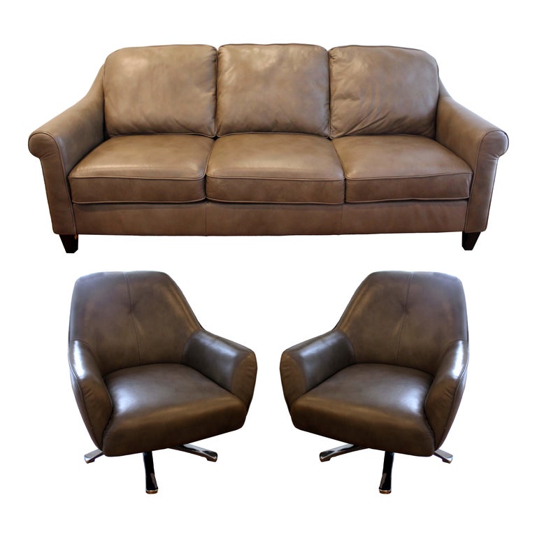 Contemporary Transitional Pair of Naugahyde Swivel Chairs and Sofa For