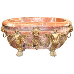 Used Rare Carved Solid Rouge Marble and Figural Bronze French Bathtub, circa 1930s