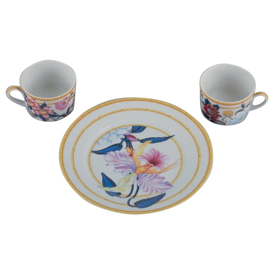 Porcelaine De Paris "Aurore Tropicale". Two coffee cups and a plate, Limoges For Sale