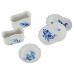 Five pieces of Royal Copenhagen Blue Flower braided porcelain.