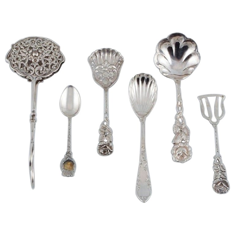A collection of 6 pieces of various silver and plated silver.
