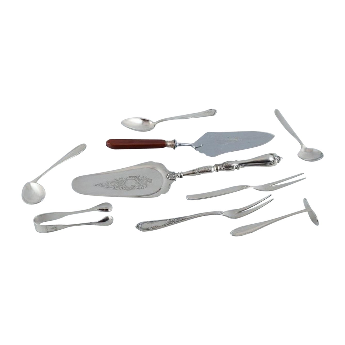 A collection of 9 pieces of various plated silver.