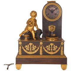 19th Century French Empire Gilt and Patinated Bronze Mantel Clock