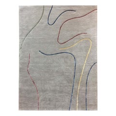 "Lines" , 100pct wool hand-knotted carpet, grey theme, colourful lines running 