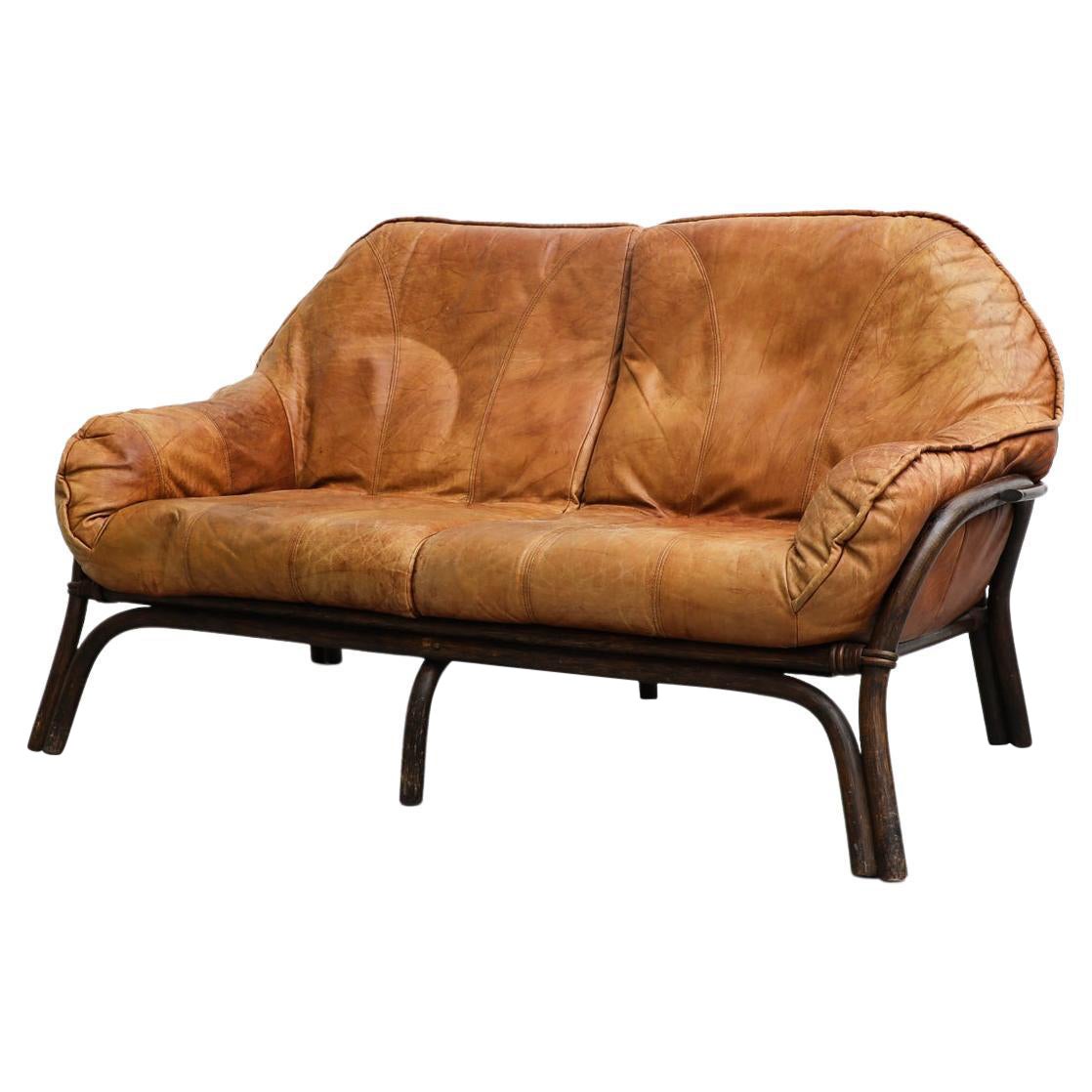 Fauteuil brutaliste de style Percival Lafer avec cadre en bambou et coussins en cuir cognac en vente