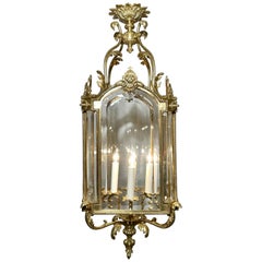 Lanterne française ancienne en bronze doré et verre biseauté, vers 1900.