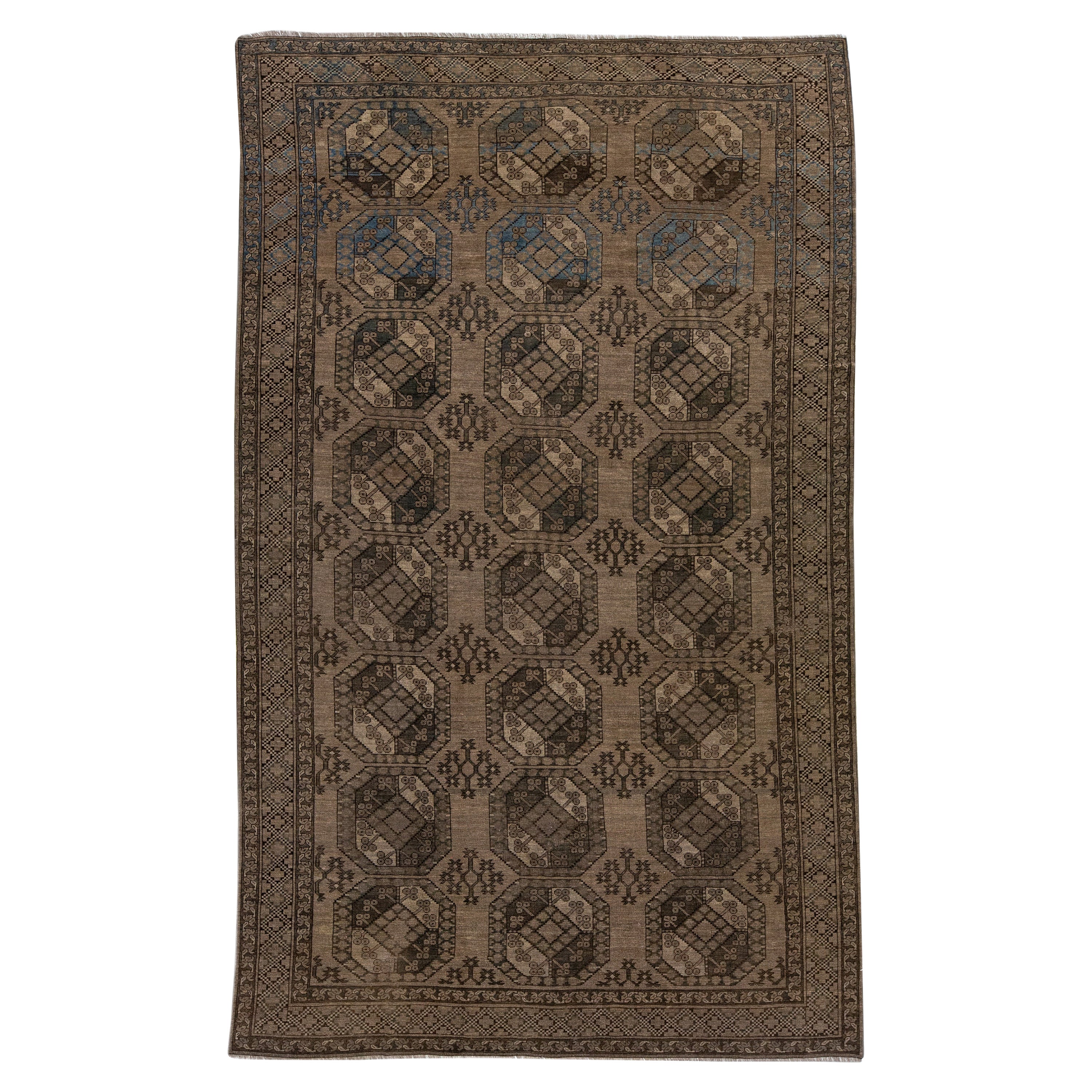Antique Turkmen Handmade Wool Brown Rug with Gul Design For Sale