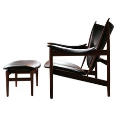 Set of Chieftain Armchair and Chieftain Stool in Wood and Leather by Finn Juhl