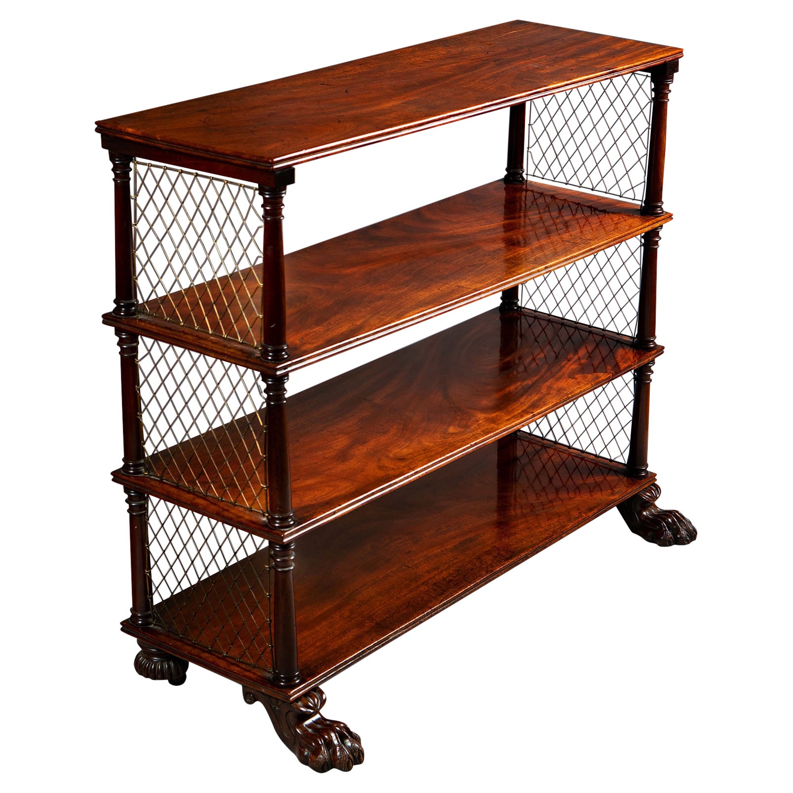 Regency bookcase with lattice brass ends For Sale