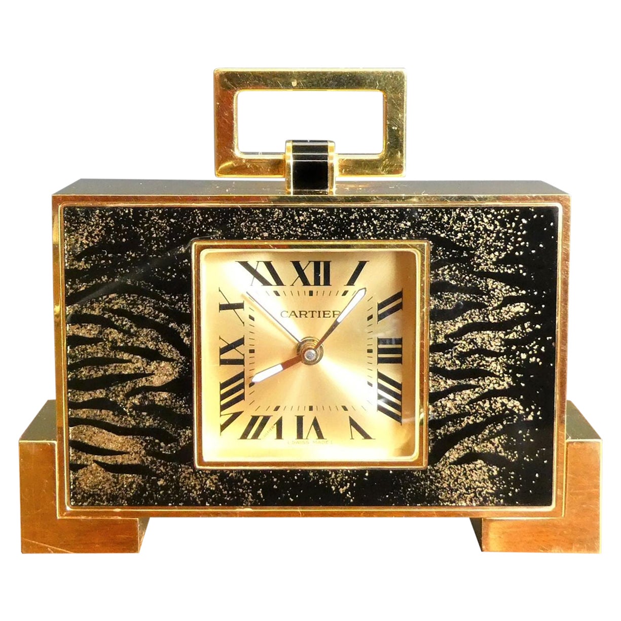 Cartier, horloge de voyage imprimée léopard en vente