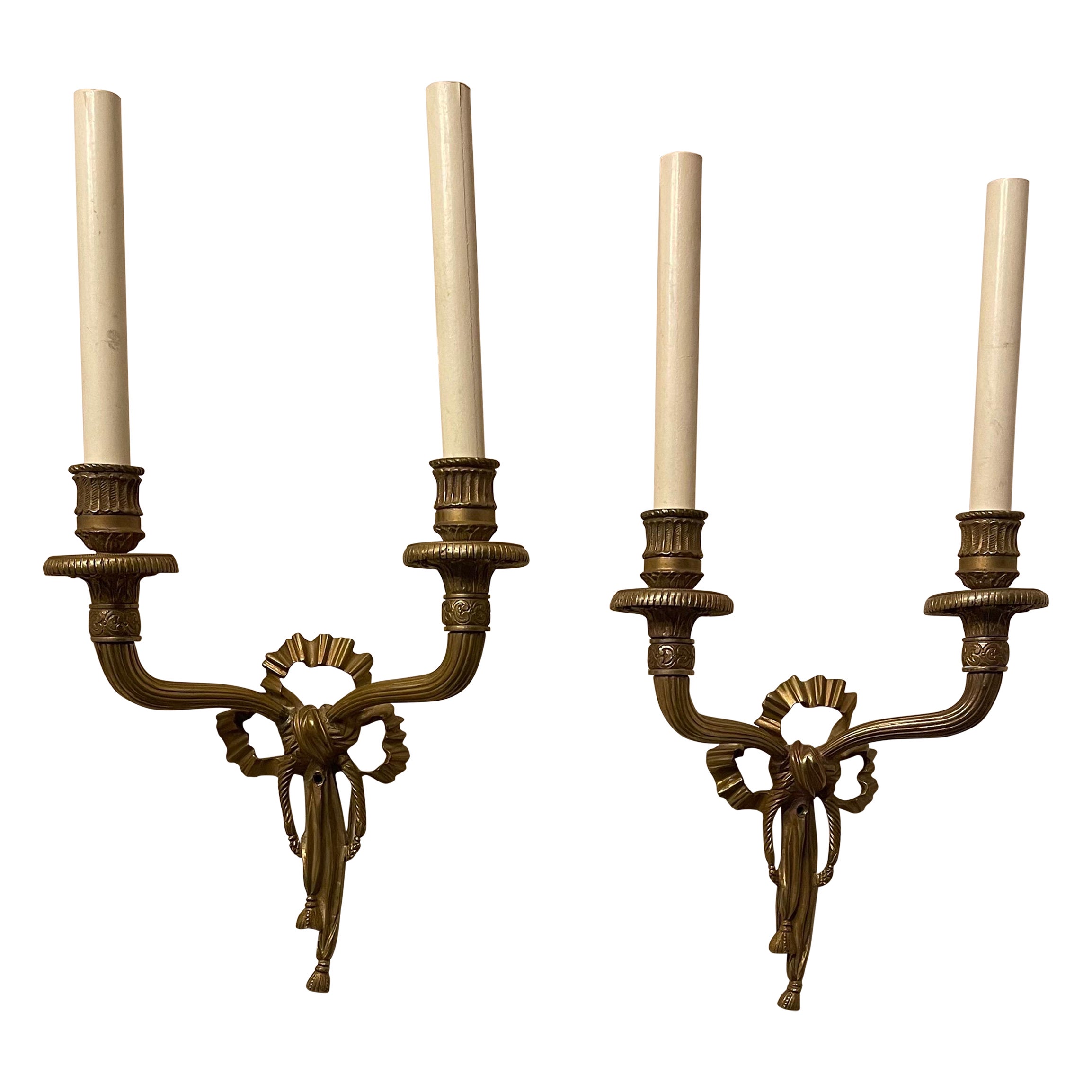 Wonderful Pair French Dore Bronze Caldwell Ribbon Tassel Wreath Two-Arm Sconces For Sale