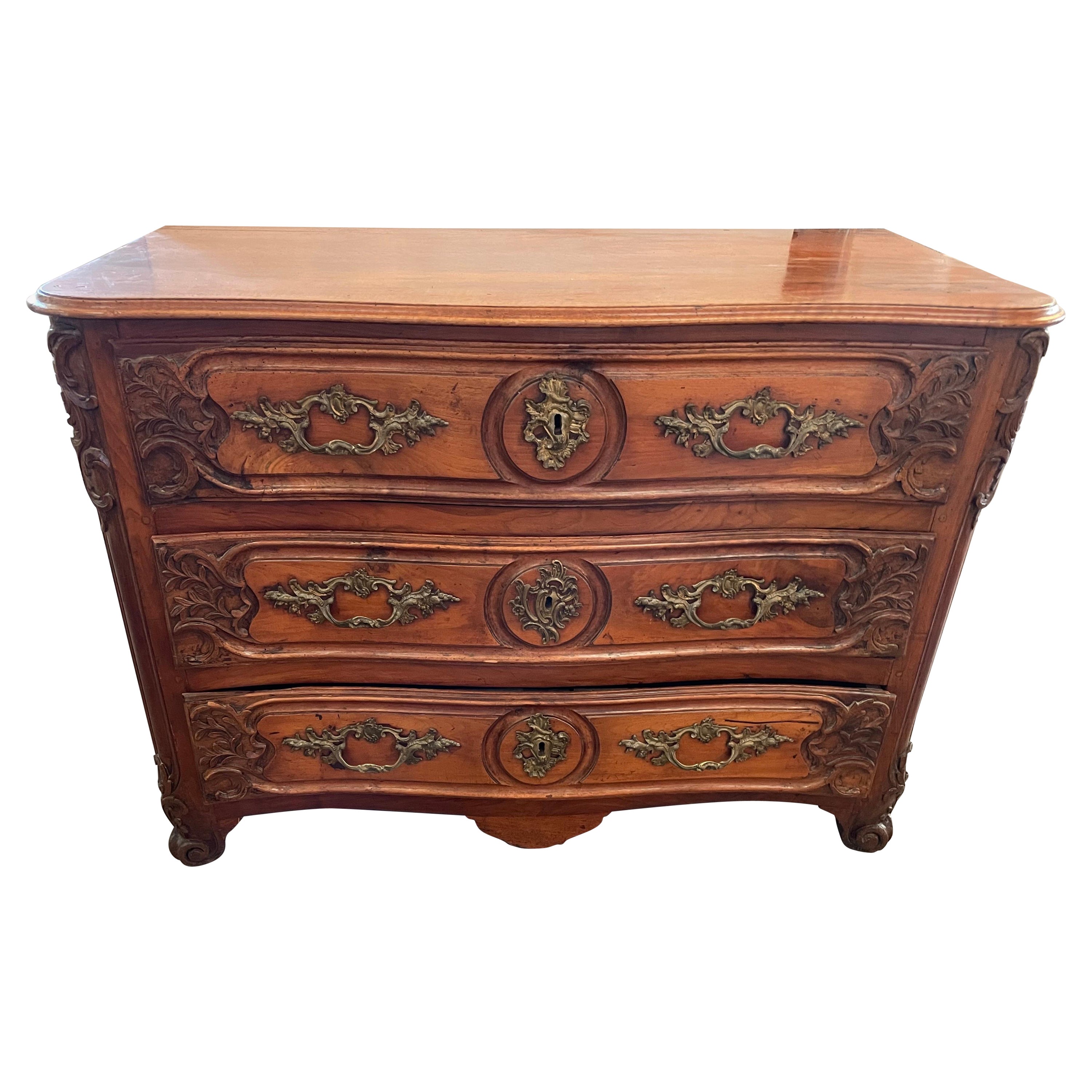18th Century French Walnut Commode with Brass Fixtures For Sale