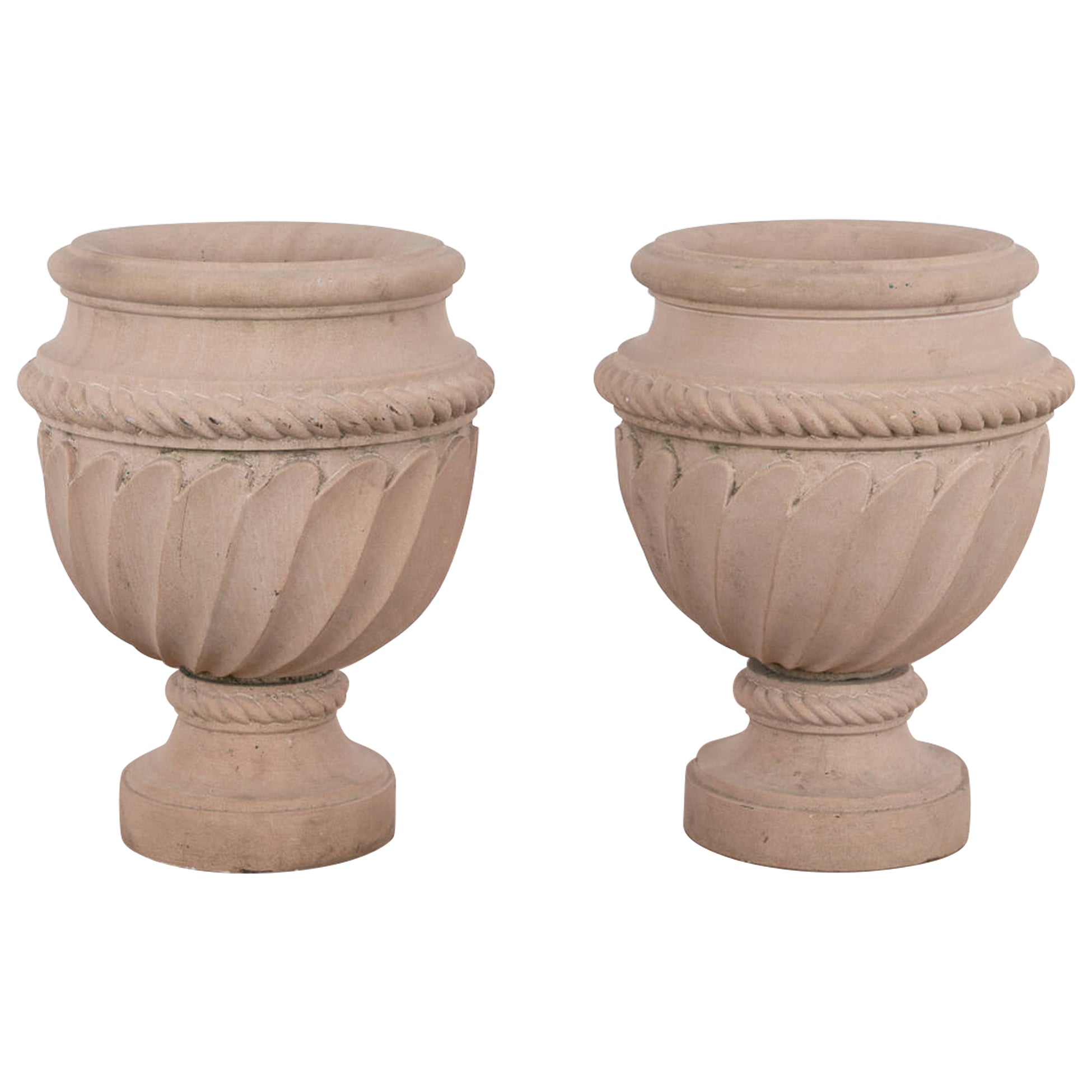 Pair of Carved Pink Stone Urns, 20th Century