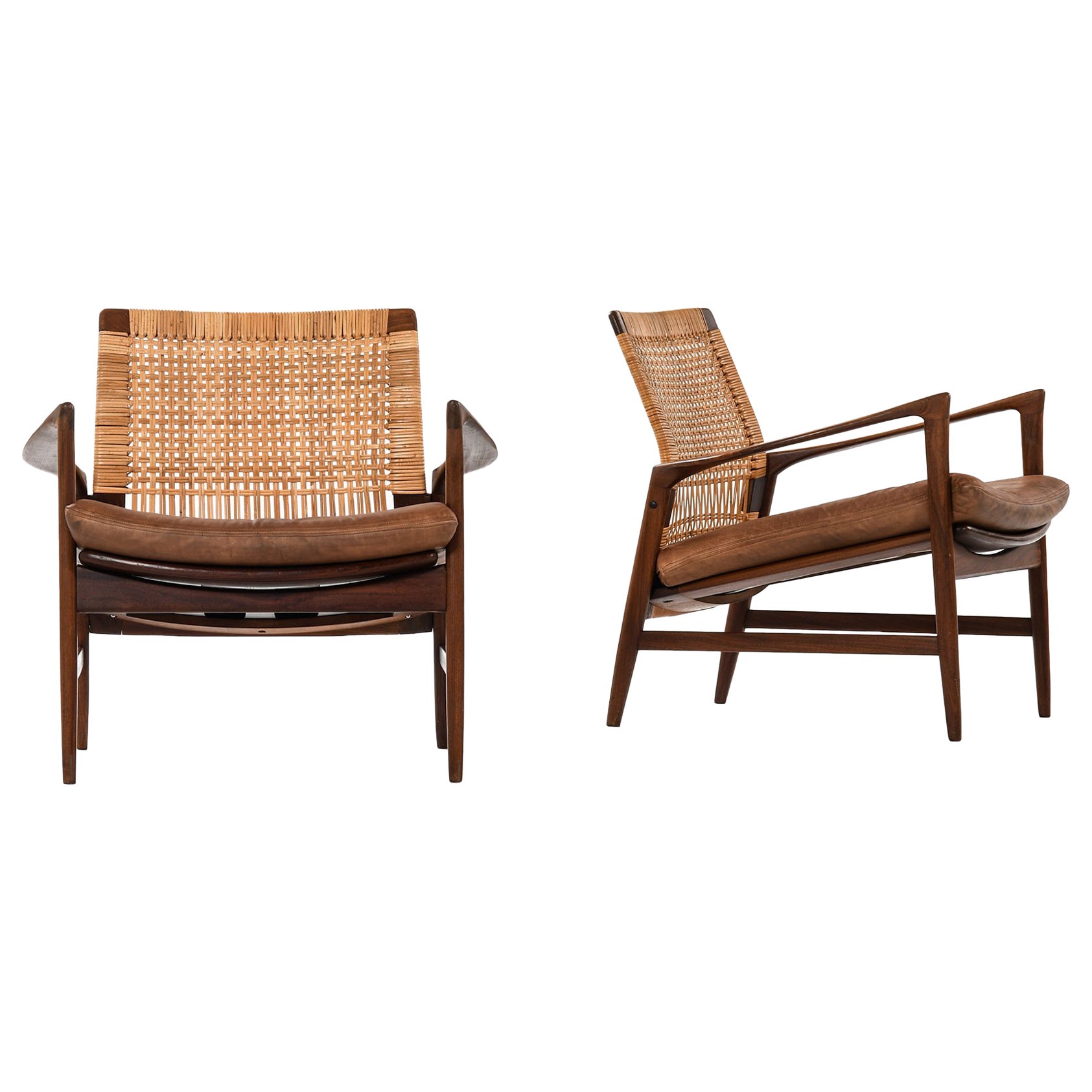 Pair of Easy Chairs in Teak, Cane with Brown Leather by Ib Kofod-Larsen, 1950s