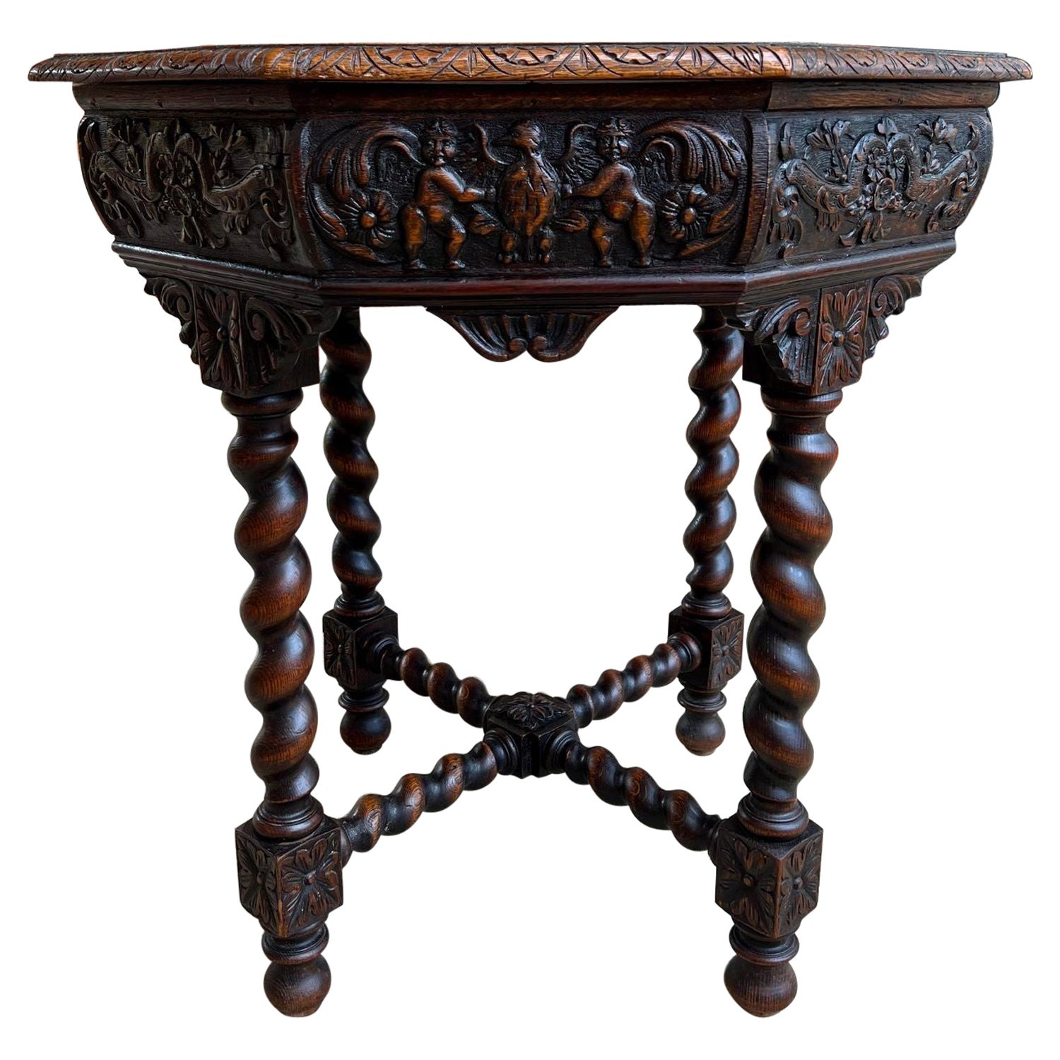 Ancienne table de canapé octogonale française sculptée en chêne à torsion d'orge de style Louis XIII Renaissance