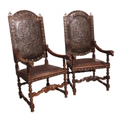 Pair of Spanish 19th Century Tooled Leather and Walnut Armchairs with Rams Heads