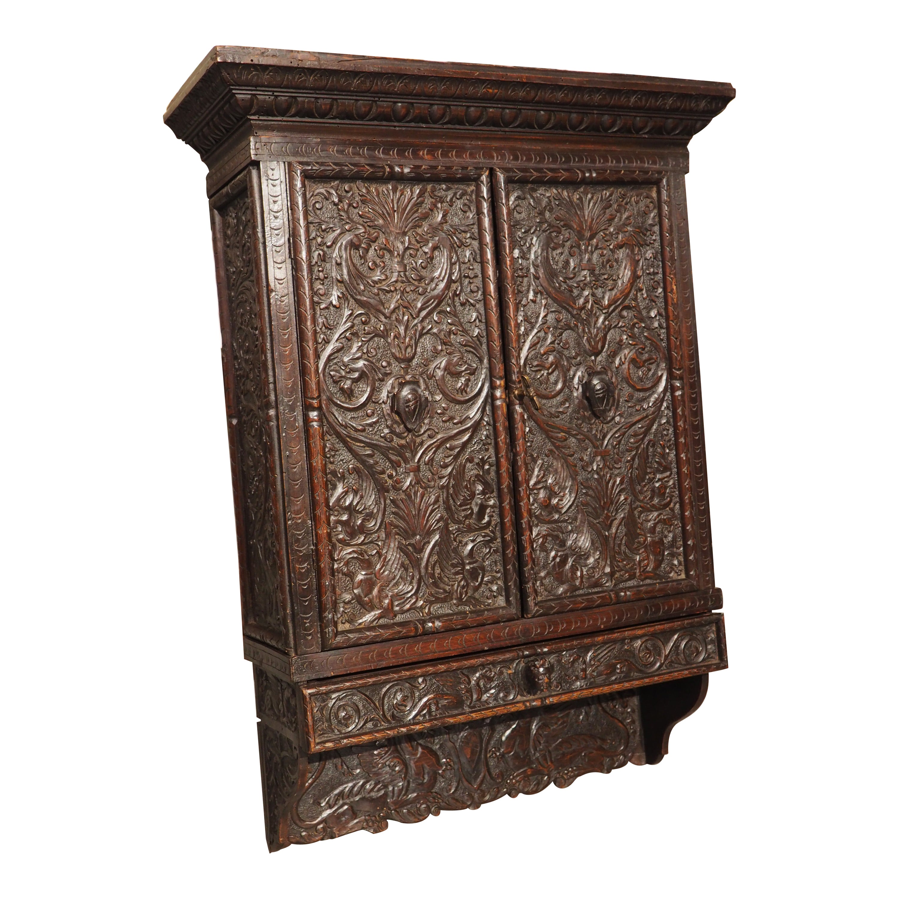 Circa 1830, Italian, Walnut Wood Wall Cabinet in the Renaissance Style For Sale