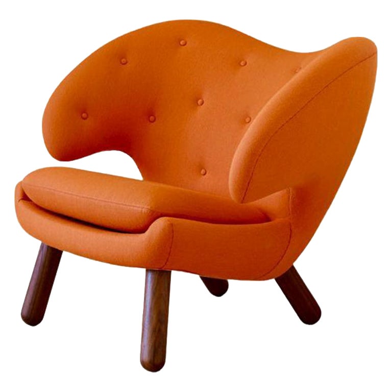 Finn Juhl Pelican Chair Upholstered in Orange Fabric
