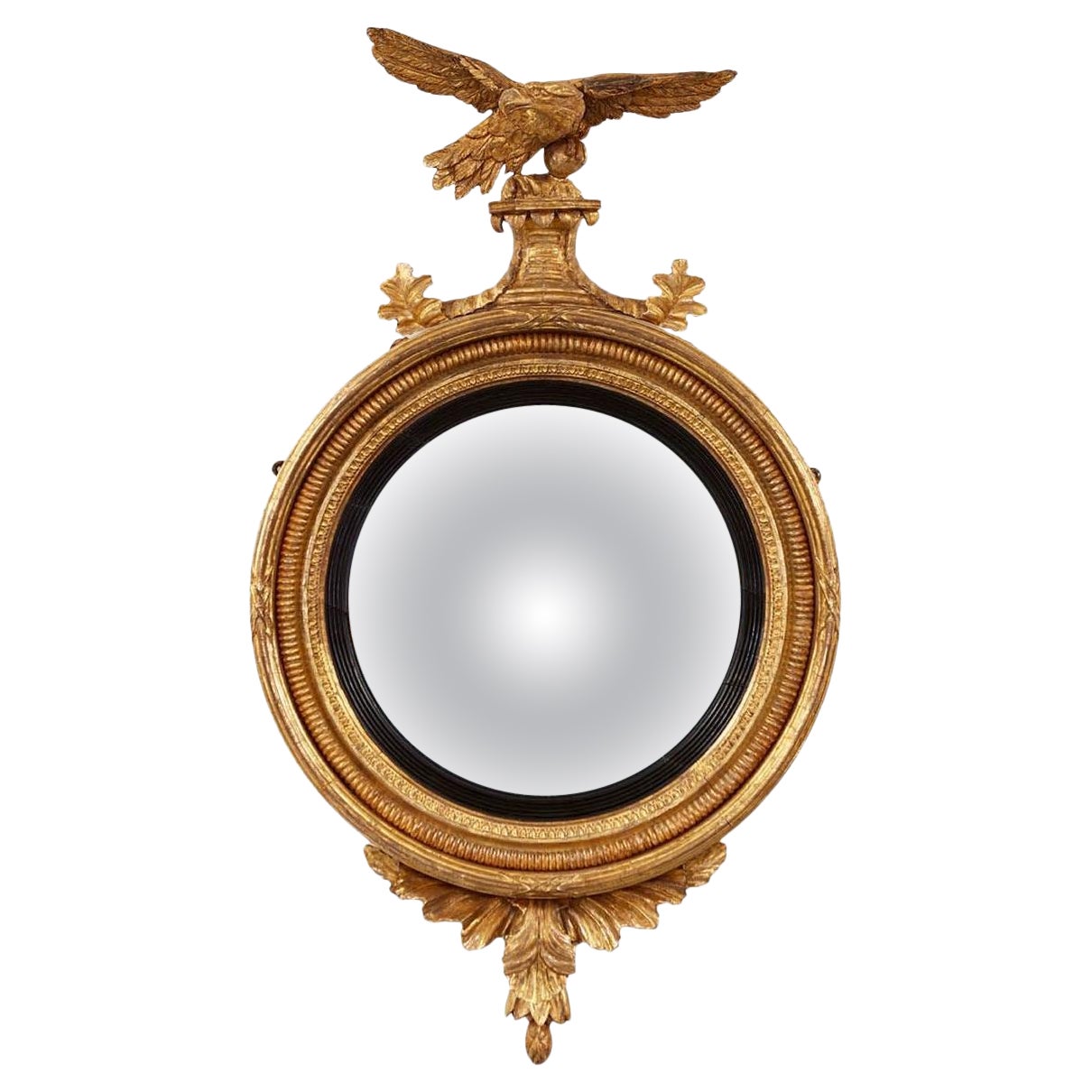 18th Century French Golden Regency Convex Mirror Topped by an Eagle For
