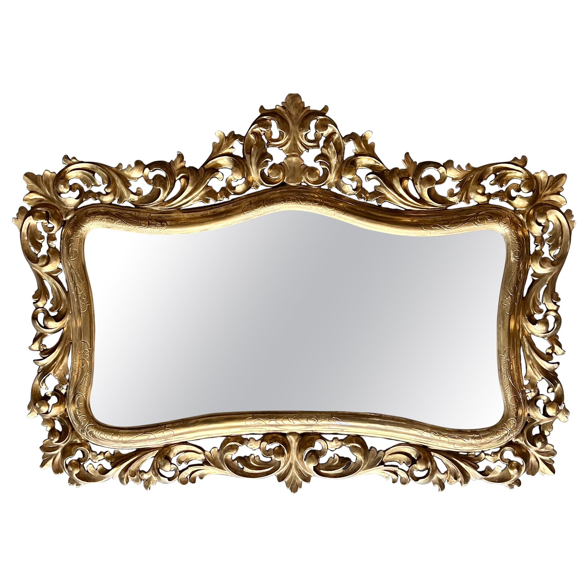 Miroir en bois sculpté et doré du début du XXe siècle de style Empire français en vente