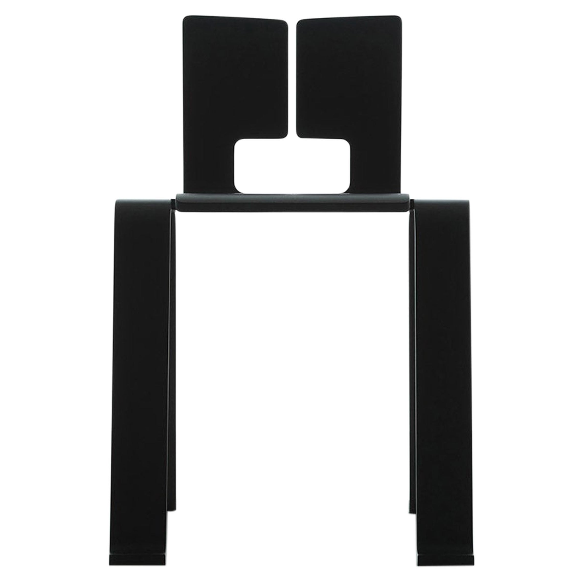 Chaise Ombra Tokyo de Charlotte Perriand, en chêne teinté noir par Cassina