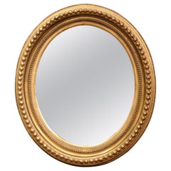 19th Century, French, Napoleon III Carved Giltwood Oval Wall Mirror 