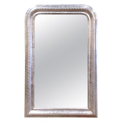 Miroir mural Louis Philippe du 19ème siècle en feuilles d'argent avec motifs géométriques