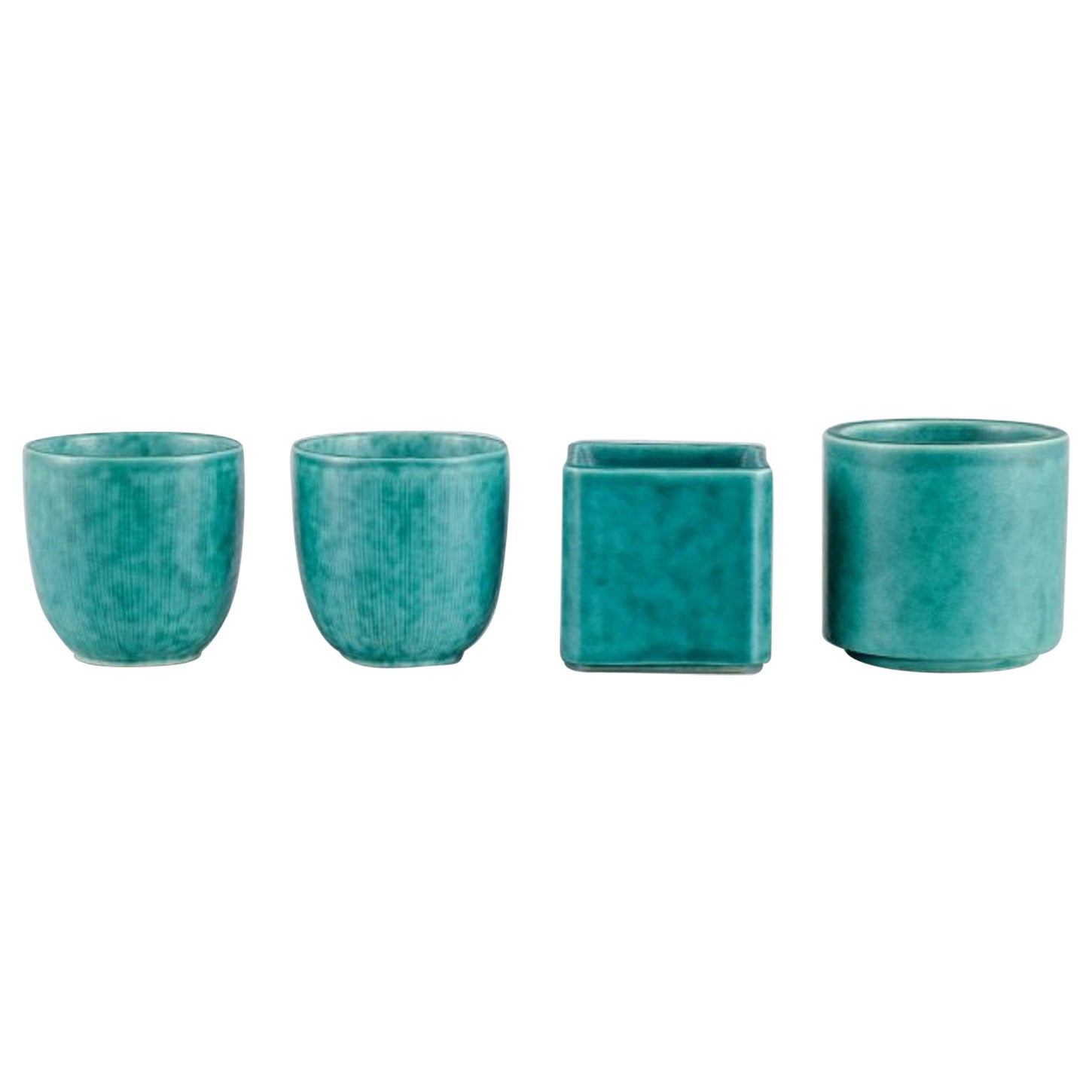 Wilhelm Kåge for Gustavsberg. Four Argenta Art Deco vases in glazed ceramics. For Sale