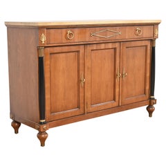 Baker Furniture Neoclassical Cherry, Gold Gilt, and Parcel Ebonized Sideboard