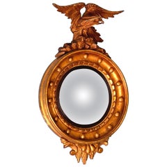 Petit miroir convexe doré de style Régence du 19e siècle