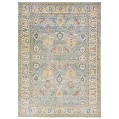 Tapis moderne en laine Sultanabad à motifs floraux faits à la main avec fond bleu clair