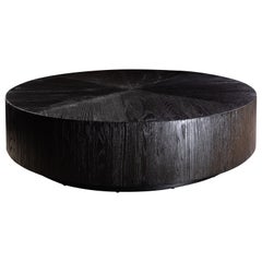 Segmented Round Black Oak Coffee Table