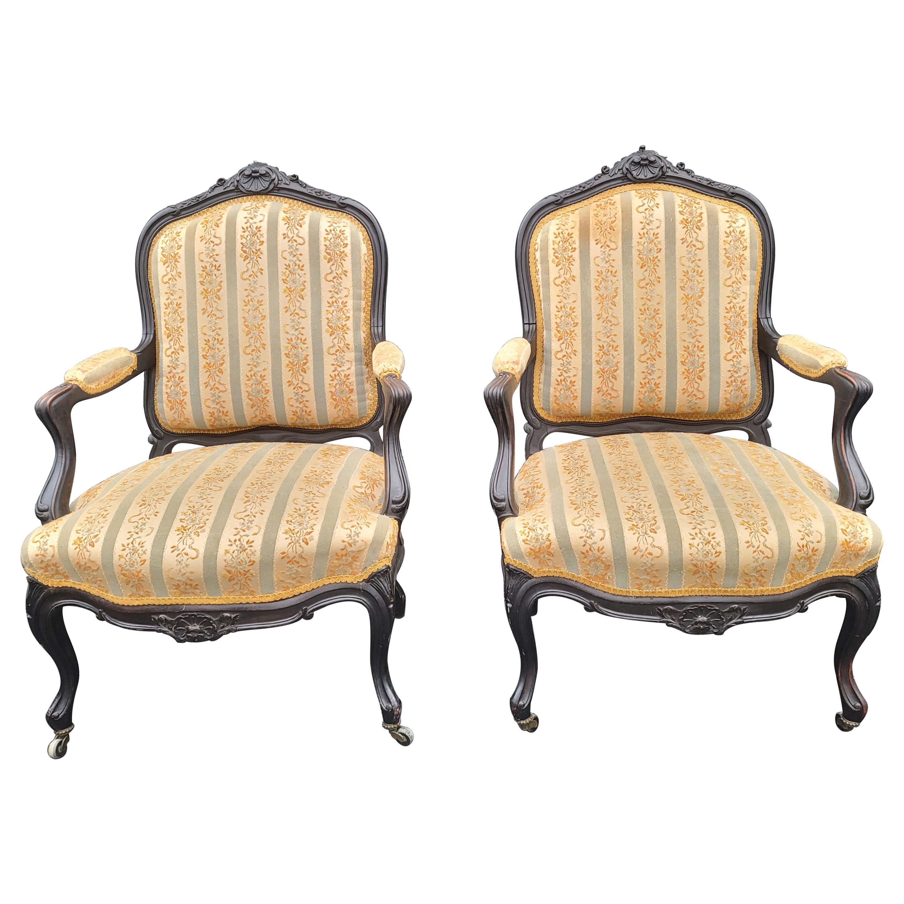 Pair of  1890s Louis XV Carved, Ebonized and Upholstered Bergere  Arm Chairs For Sale
