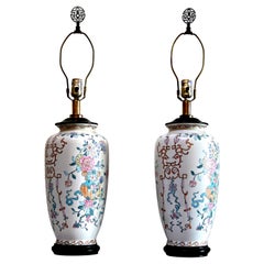 Pair of Famille Rose table lamps with boughs of Flowers and Hand Painting