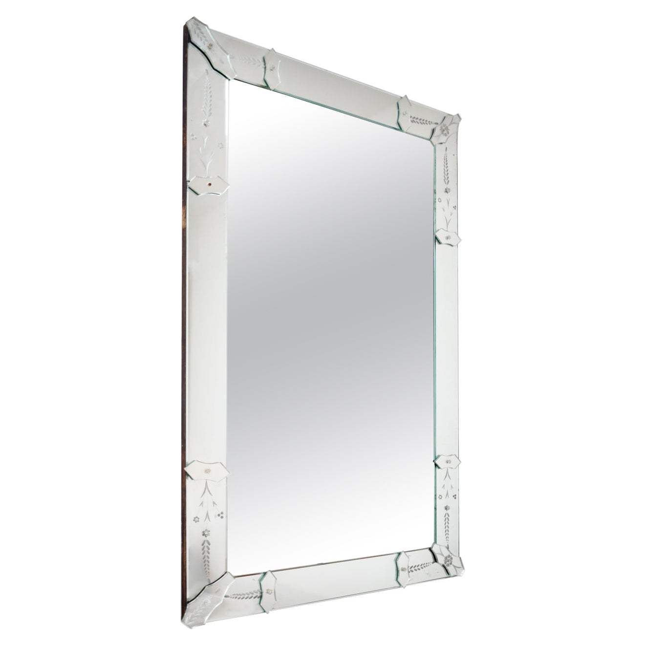 Rectangular mirror in the style of Venice, the border engraved with floral decor