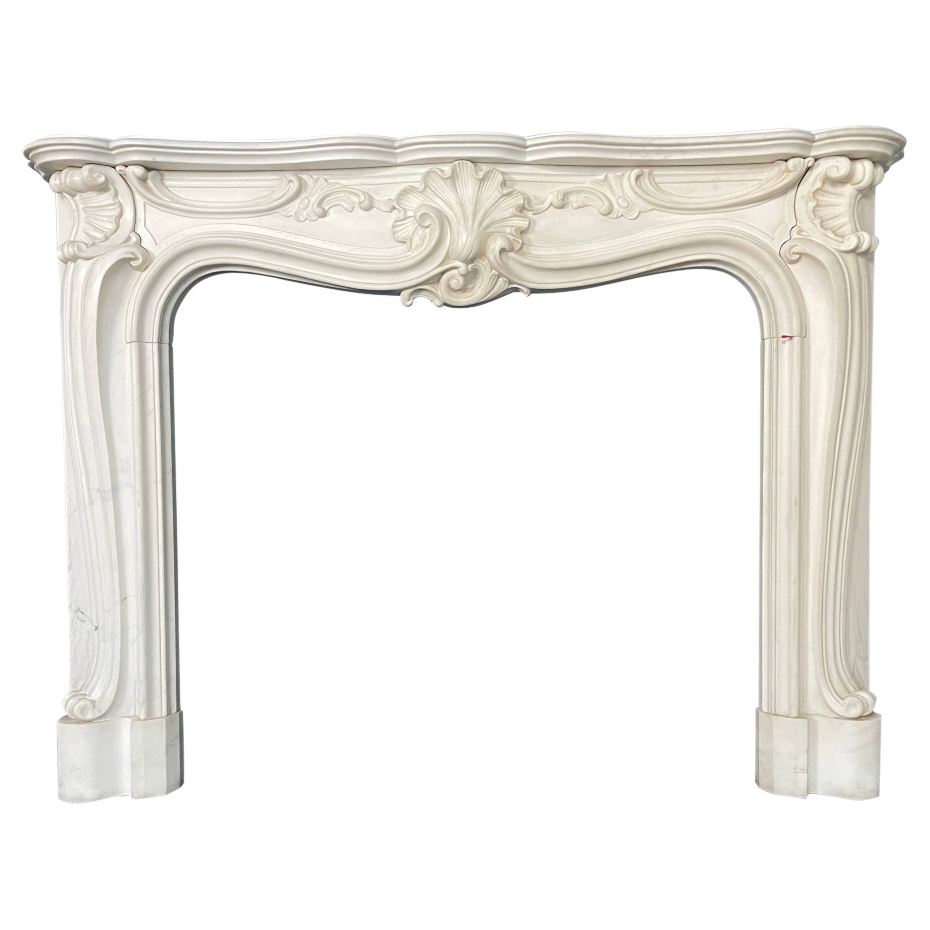A Reclaimed Rococo French Style Marble Fireplace Mantel  For Sale