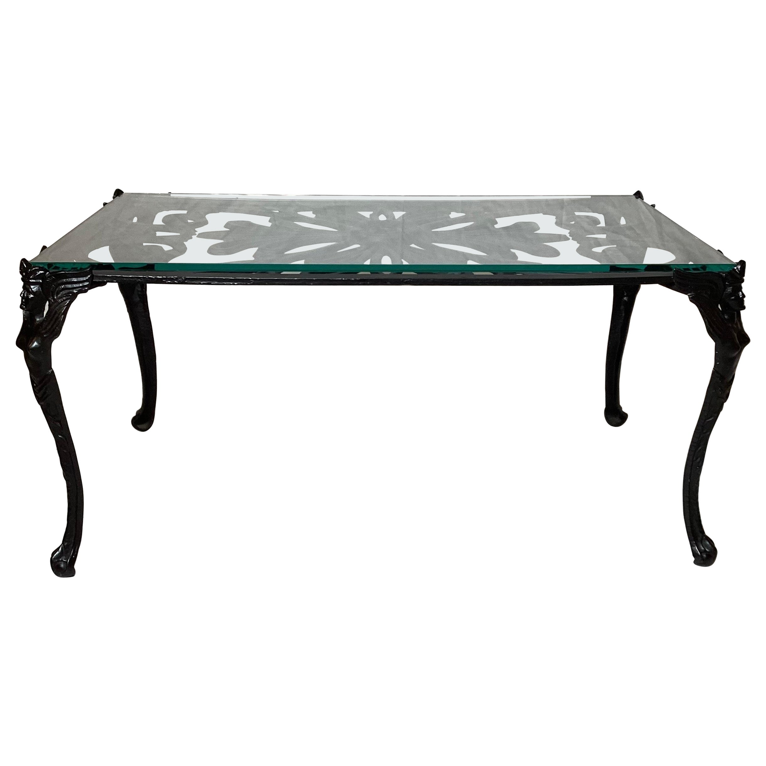 Cast Iron Coffee Table with Glass Top and Winged Woman on Corners For Sale