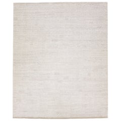 Alfombra moderna minimalista de lana estilo marroquí con campo beige by Apadana