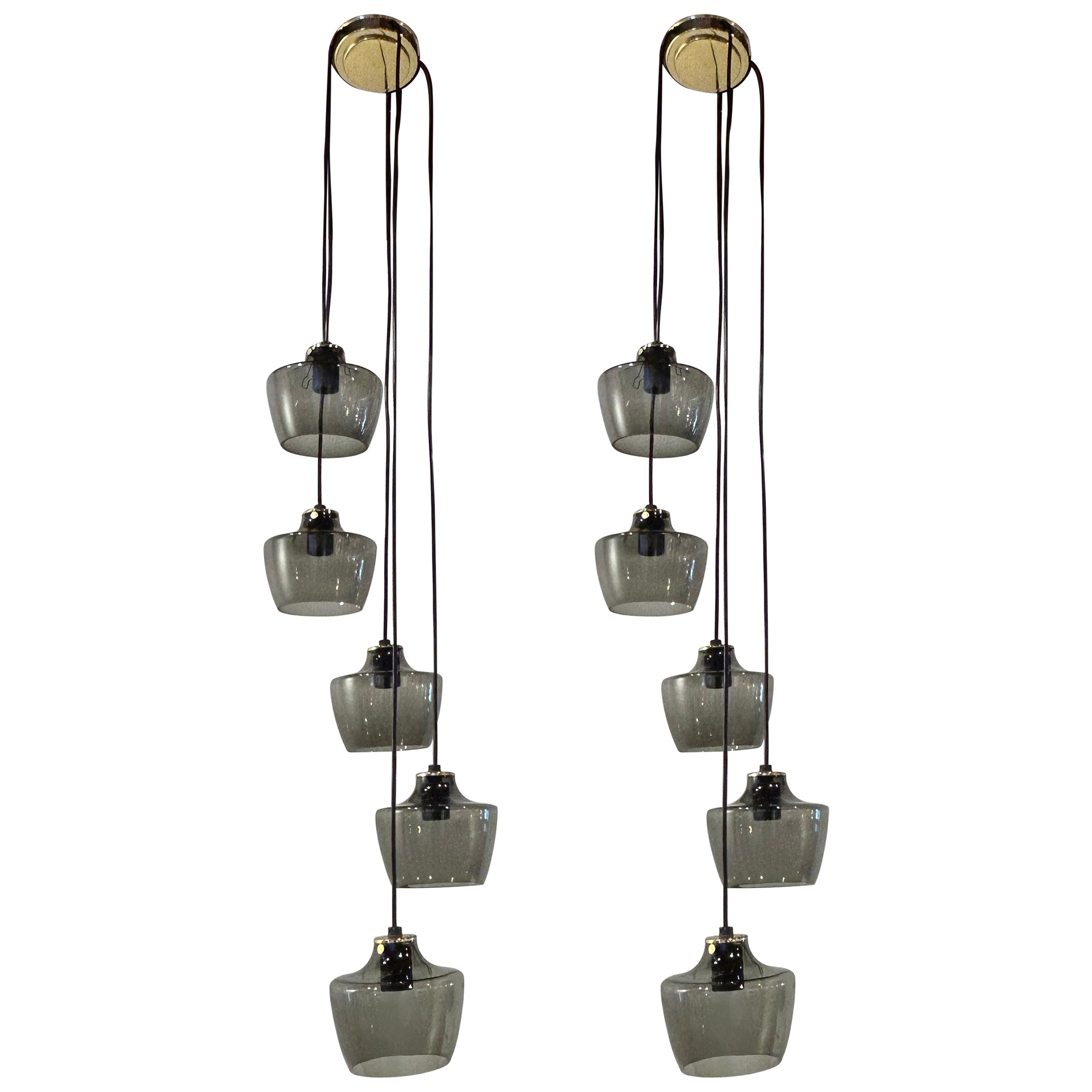 Pair of Adjustable European Brass and Glass Chandeliers