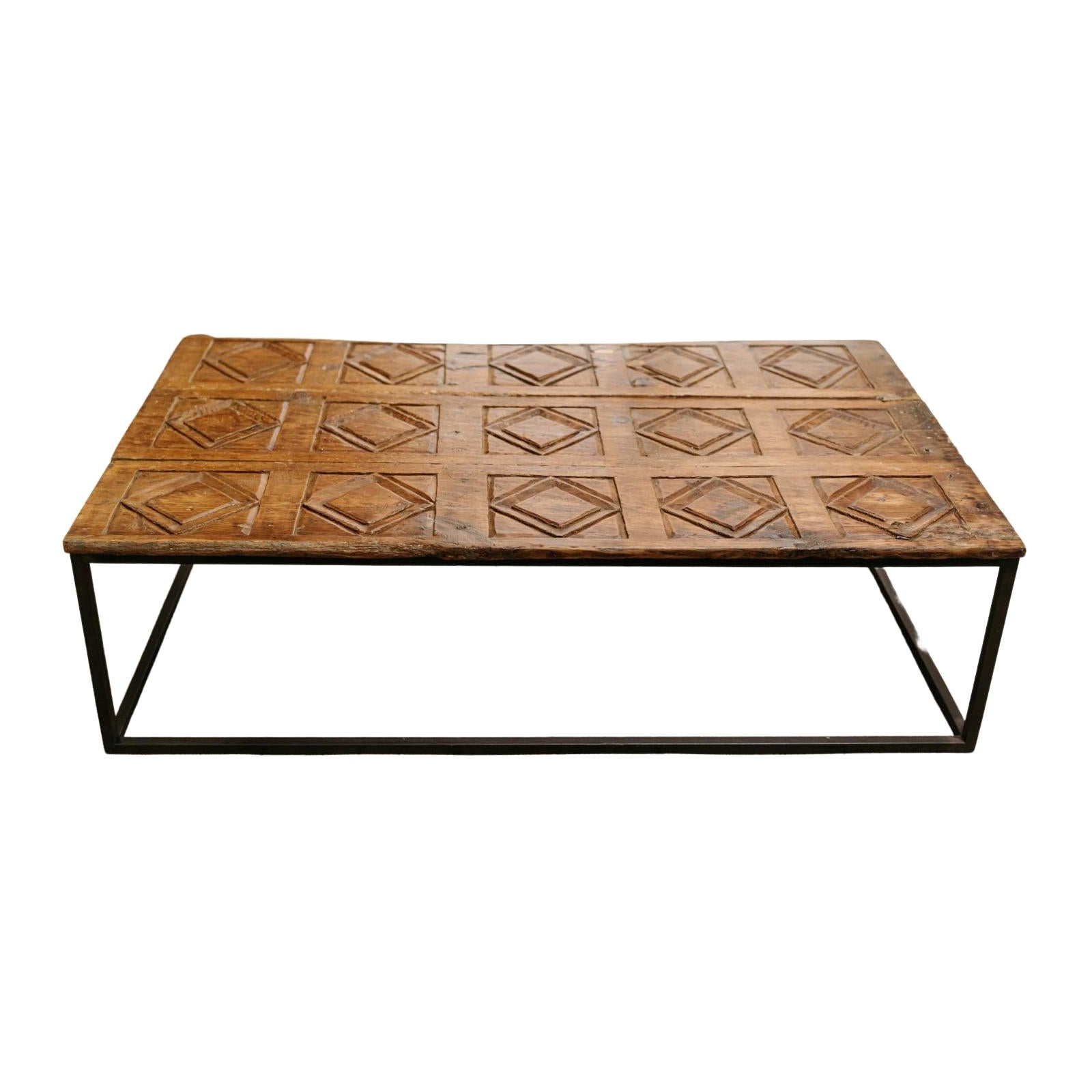 19th century Spanish door, now made into a coffee table, contemporary iron base 