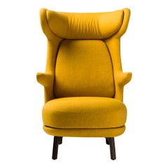 Fauteuil Dino contemporain en tissu jaune monocolore fait par Jaime Hayon