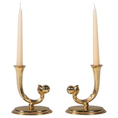 Paar vergoldete Metall-Kerzenständer W.M.F. Deutschland, Mitte des 20. Jahrhunderts.