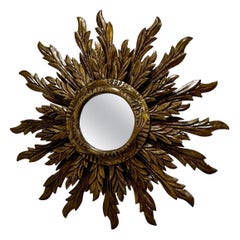Romantic Ornately Carved Italian Sunburst Mirror with Antique Gold Finish