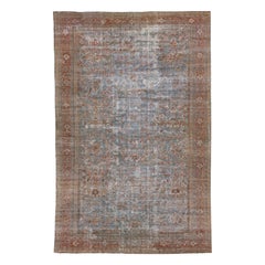 Tapis bleu 1900s fait à la main en laine perse antique Mahal avec motif à feuilles persistantes